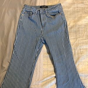High rise Super Flare striped jeans. Darker blue color.